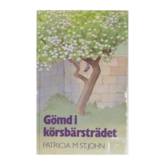 Patricia M. St. John: Gömd I Körsbärsträdet